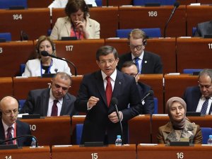 AP'de Kürkçü sordu, Davutoğlu cevapladı